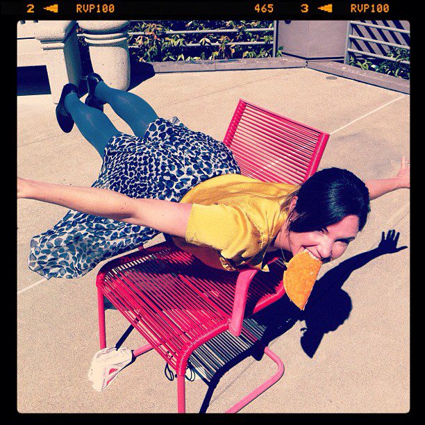 4310846e124111e280961231380fe8a6_7 A woman is laying on the ground in a chair